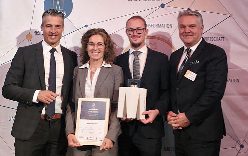 vlnr: LAUFEN Austria: Christian Schäfer, Managing Director, Regine Perina, Finance Manager, Thomas Weißenböck, Quality & Environment Manager und Christian Babinetz, Sales Manager